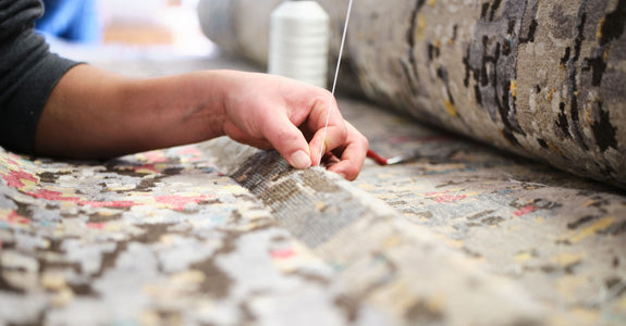 Landry and Arcari Expert Rug Repair Technician Fixing an Antique Rug