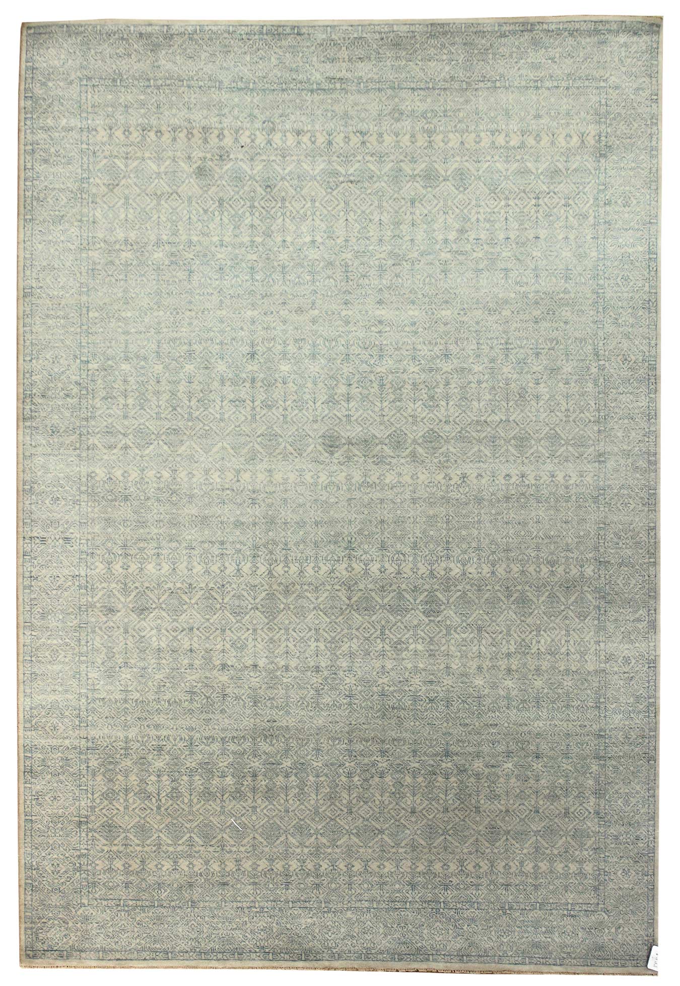 Handwoven Age rug, J50613, featuring a light beige background with a subtle blue geometric pattern.