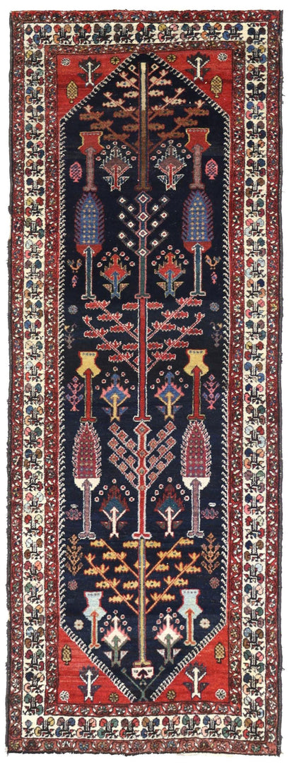 Antique Bakhtiari handwoven tribal rug J67494, navy blue field with red & ivory border, tree of life design.
