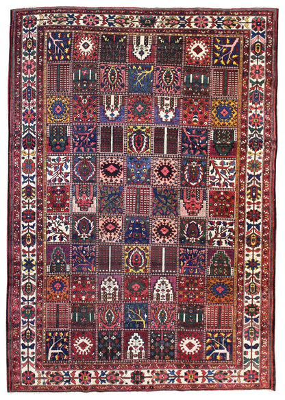 Antique Bakhtiari handwoven tribal rug JF8331: vibrant red, blue, & green patchwork design.
